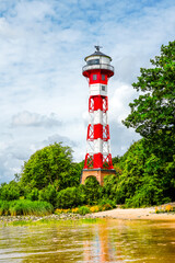 Wittenbergen lighthouse on the Rissener Ufer near Hamburg. Historic lighthouse on the Elbe....