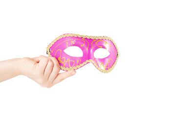 Carnival mask in hand, pink vintage masquerade accessory isolated