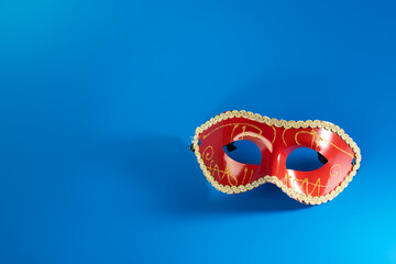 Carnival mask, masquerade party, blue background