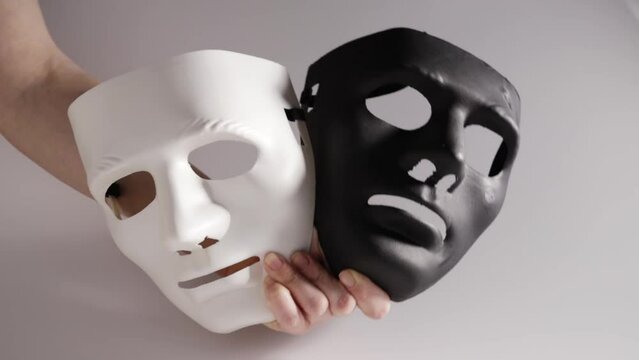 Black and white mask, good and evil, truth and lies, split personality, schizophrenia,