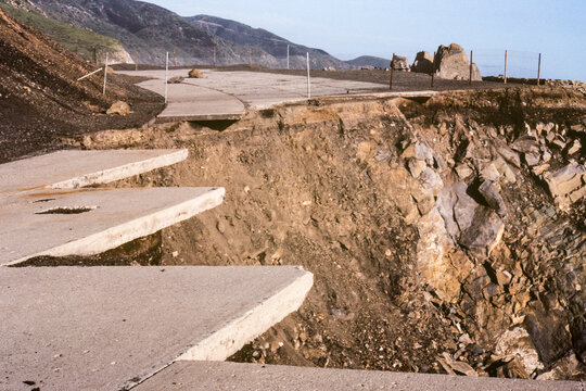 Archival 1983 view of collapsed storm damaged section of Pacific Coast Highway north of Malibu at Point Mugu in Ventura County, California.  Shot on film.