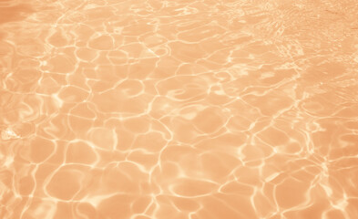 Water surface texture in peach fuzz color