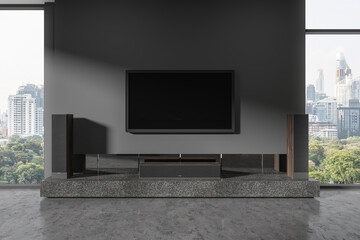 Grey living room interior with tv display with soundbar, panoramic window