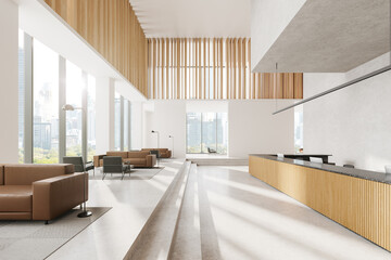 Light office interior lobby with reception desk and waiting space, window