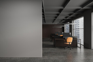 Grey workspace interior with pc computer and panoramic window. Mock up wall