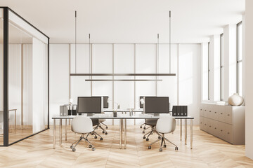 Modern office workplace interior with pc computers and desk in row near window