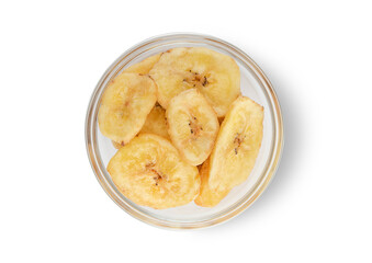 Healthy organic dried sweet banana chips on white background.Top view.Macro.