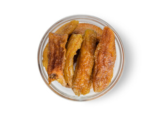 Organic dried sweet bananas on white background.Top view.Macro.