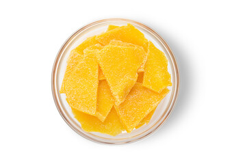 Dried sweet mango slices on white background.Top view.Macro.