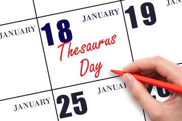 January 18. Hand writing text Thesaurus Day on calendar date. Save the date.