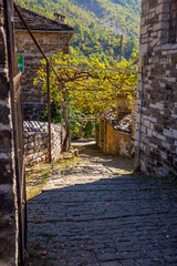 Picturesque alley in Mikro Papigo, one of the most beautiful greek mountainous villages, Zagori...