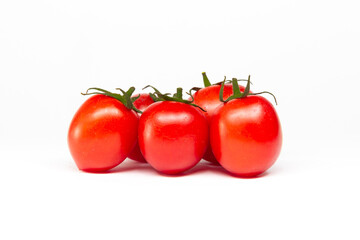 Red cherry tomatoes isolated on white