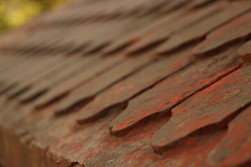 A closeup shot of red Curvy roof shed tile with selective focus