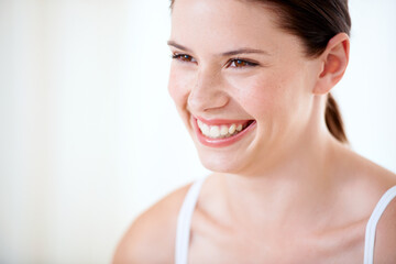 Happy, portrait and woman with skincare from beauty, cosmetics and white background in studio. Model, smile and person with luxury dermatology, facial and skin glow from wellness in spa or salon