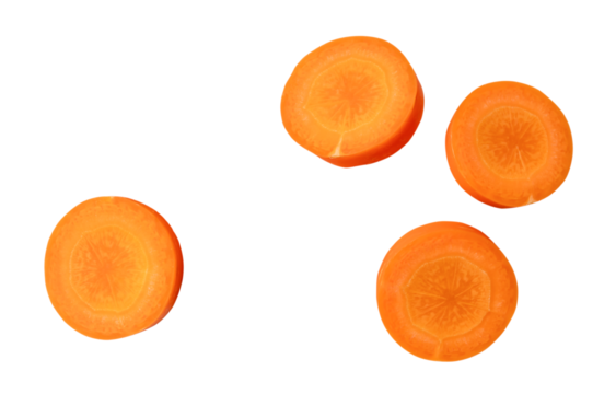Top view of fresh beautiful orange or yellow carrot slices isolated on white background with clippping path in png file format