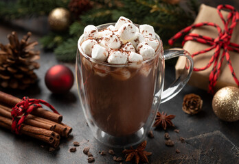 Cup of hot chocolate with holiday background