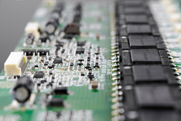 Microcircuit macro photography. Electrical components close-up. Nano technology. Capacitors and microchips.