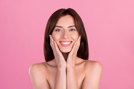 Photo of positive attractive gilr touch face look enjoy facelift lifting tightening procedure isolated pastel background