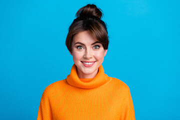 Photo of shiny cheerful lady wear knitted pullover smiling showing white teeth isolated blue color background