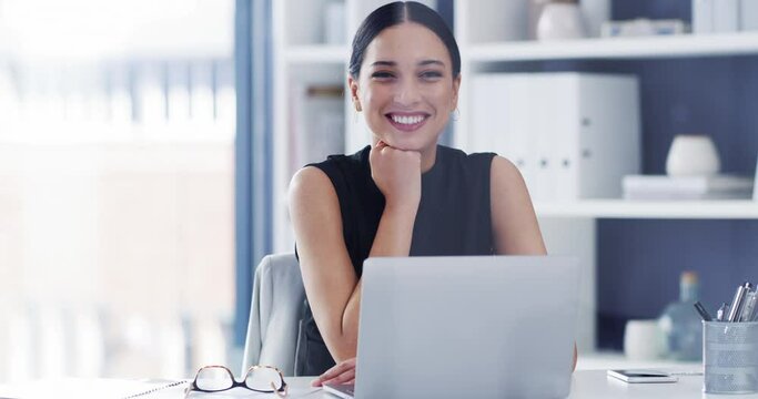 Face, business woman and smile at laptop in office for professional career, pride and corporate law firm. Portrait of happy employee, lawyer and attorney working on computer at desk in legal agency