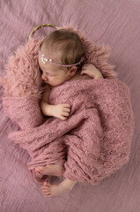 beautiful sleeping girl. A newborn girl is sleeping.