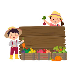 Farmer kids with wooden board and wooden boxes of vegetables