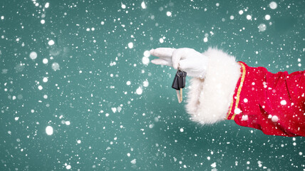 Hand of Santa Claus hold car keys