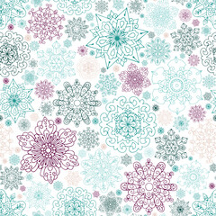 Seamless pattern with ornate snowflakes