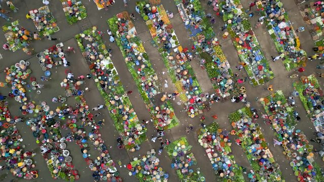 Top view of colorful local outdoor farmers market in rural Vietnam.