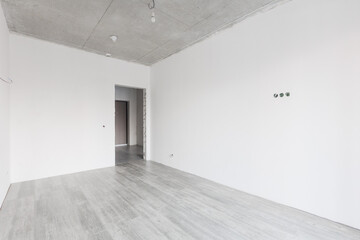 interior of the apartment without decoration in gray colors. rough finish
