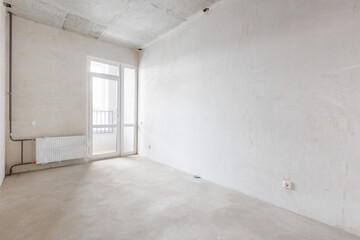interior of the apartment without decoration in gray colors. rough finish