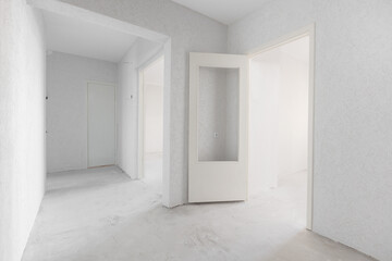 interior of the apartment without decoration in gray colors. rough finish