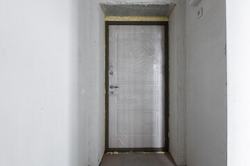 interior of the apartment without decoration in gray colors. rough finish