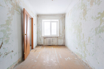 interior of the apartment without decoration in gray colors. rough finish