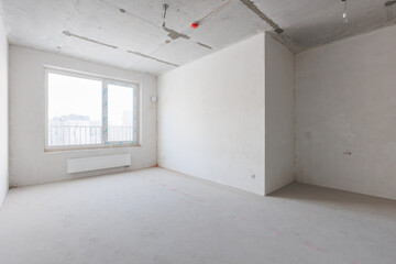 interior of the apartment without decoration in gray colors. rough finish