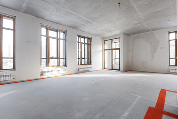 interior of the apartment without decoration in gray colors. rough finish