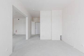 interior of the apartment without decoration in gray colors. rough finish