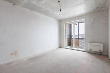 interior of the apartment without decoration in gray colors. rough finish
