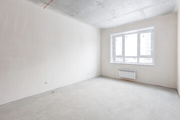 interior of the apartment without decoration in gray colors. rough finish