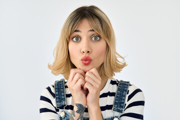 Funny pretty gen z blonde young woman, surprised 20s girl short blond hair looking at camera feeling amazed, asking please or apology, feeling embarrassed isolated on white background. Close up face