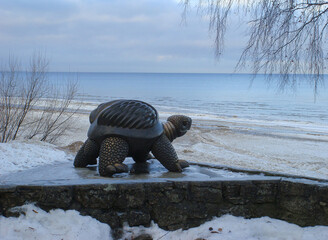 View of the turtle sculpture and sea on a winter day. Close-up. Jurmala.The Baltic States.