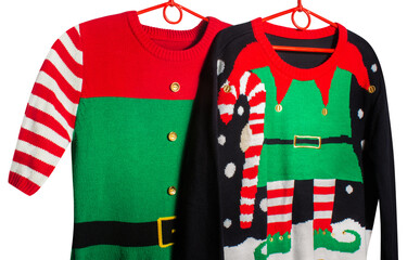 Close-up view of traditional Christmas elf costumes: elf dress and sweater, isolated