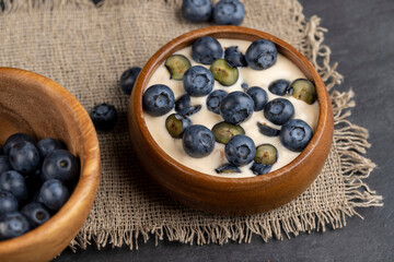 ripe blueberries and fresh creamy yogurt