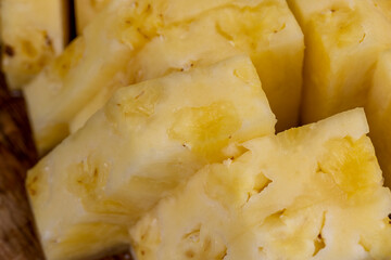 Sliced pieces of ripe yellow pineapple