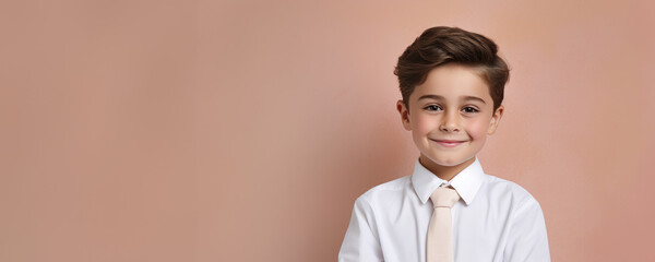 Portrait of a happy child wearing a white dress shirt and a tie against a pastel background