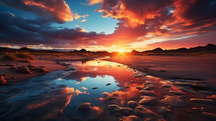 A dramatic desert sunset, as the sun dips below the horizon, casting a fiery glow on the sand dunes and creating a breathtaking and otherworldly evening scene
