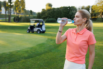 Hydration Moment: Woman Golfer at the Cart