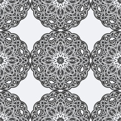 Abstract geometric floral pattern. A seamless background, vintage texture.