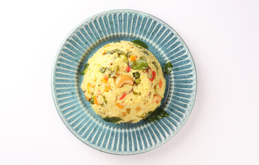 Upma made of samolina or rava upma, most famous south indian breakfast item which is arranged in a...