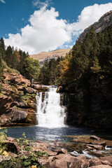 waterfall in the Ordesa y Monte Perdido National Park a beautiful summer day in the Pyrenees of...